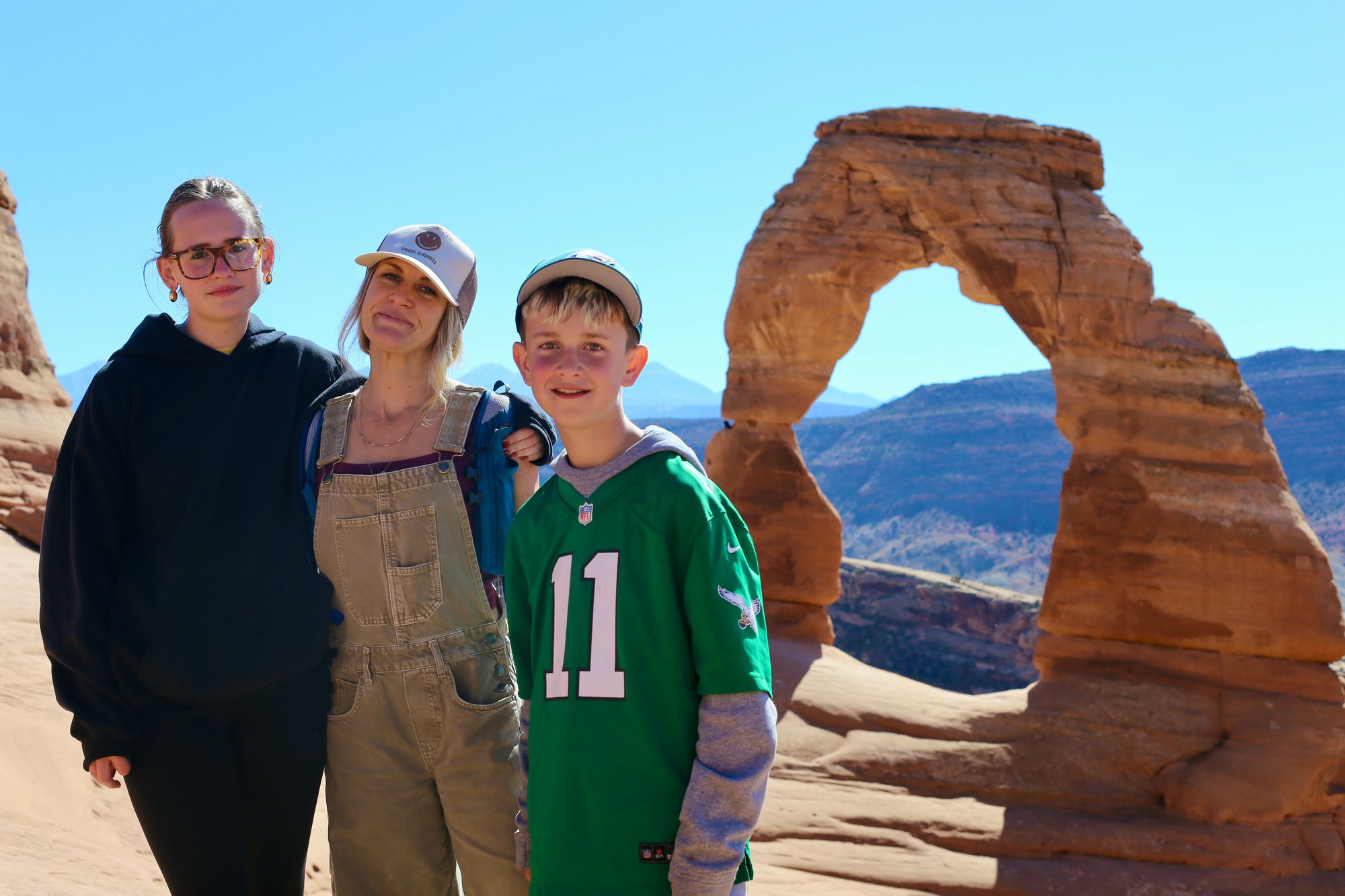 Aubrey and the kids at Delicate Arch in Moab